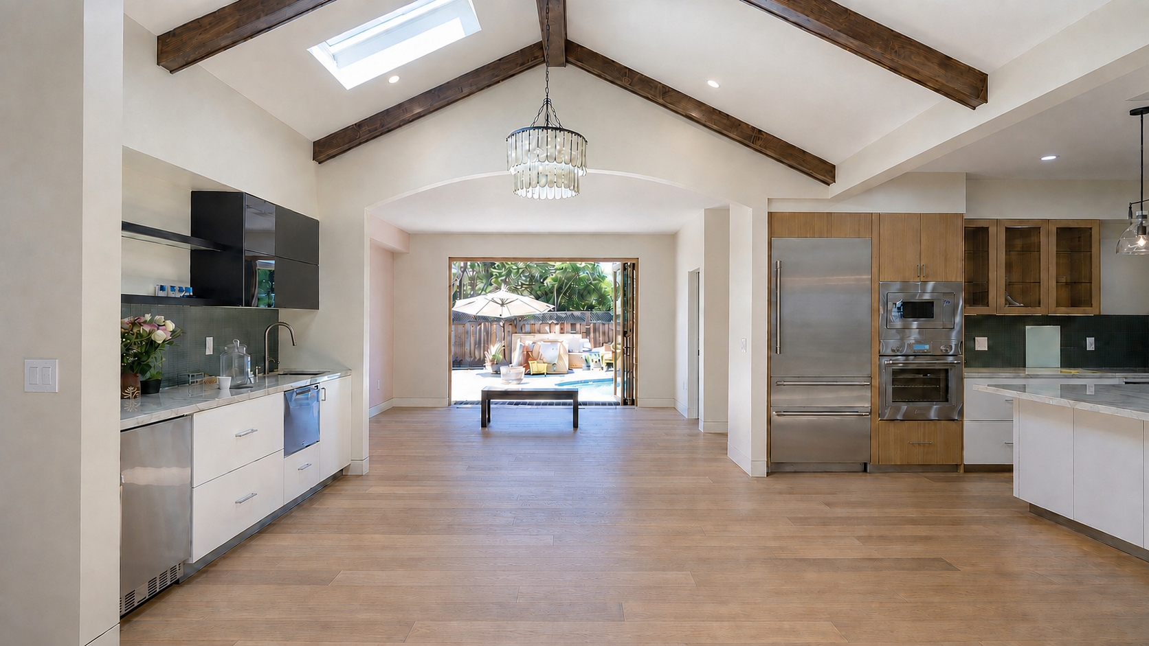 Open kitchen and living area completed by Lewis & Proveaux